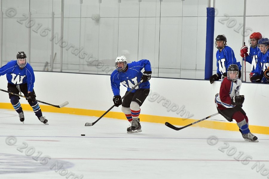 Wheaton College Men\'s Ice Hockey vs Middlesex Community College. - Photo By: KEITH NORDSTROM